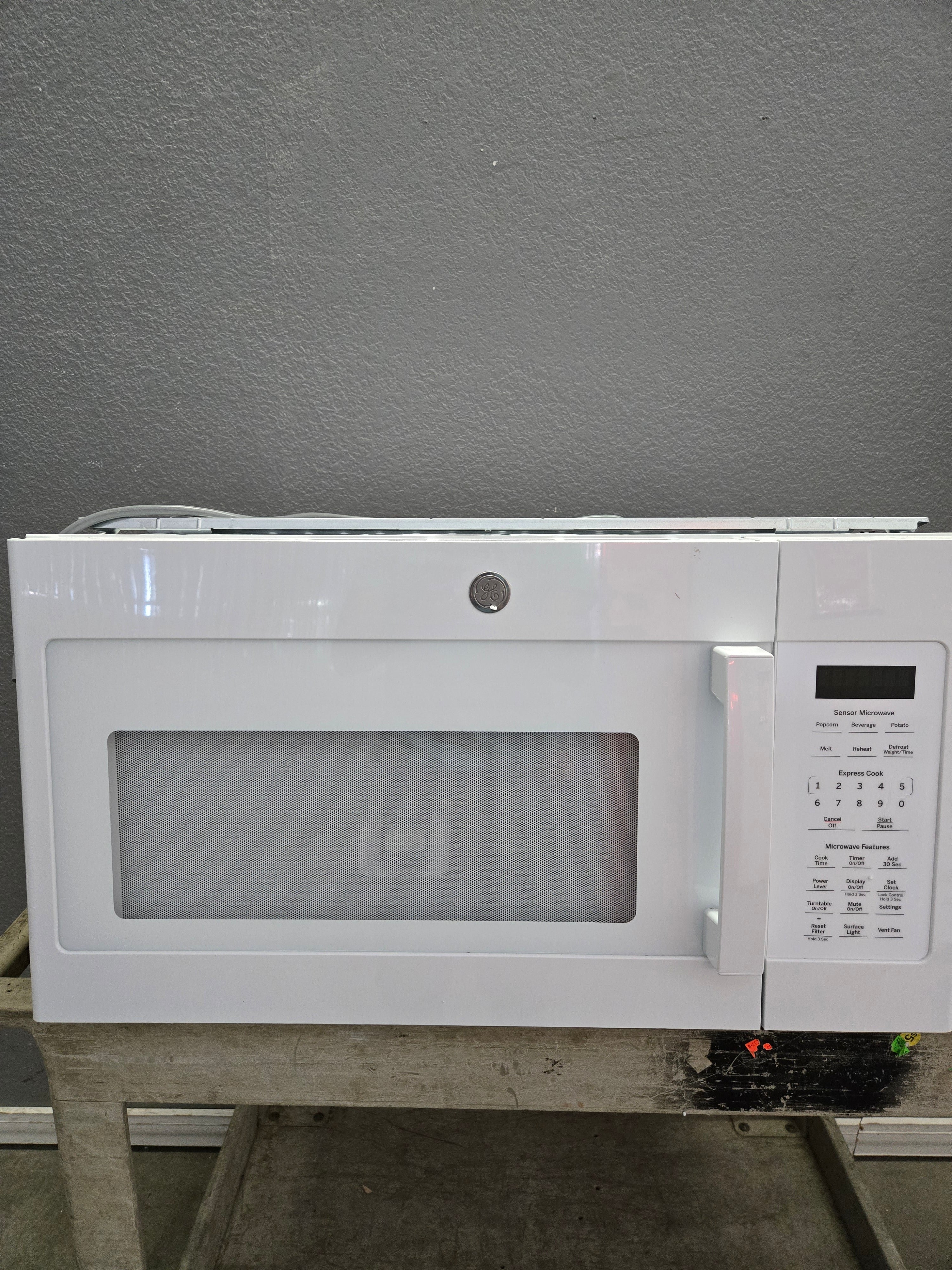 67153 GE Over-the-Range Microwave Oven – 30 Day Guarantee !